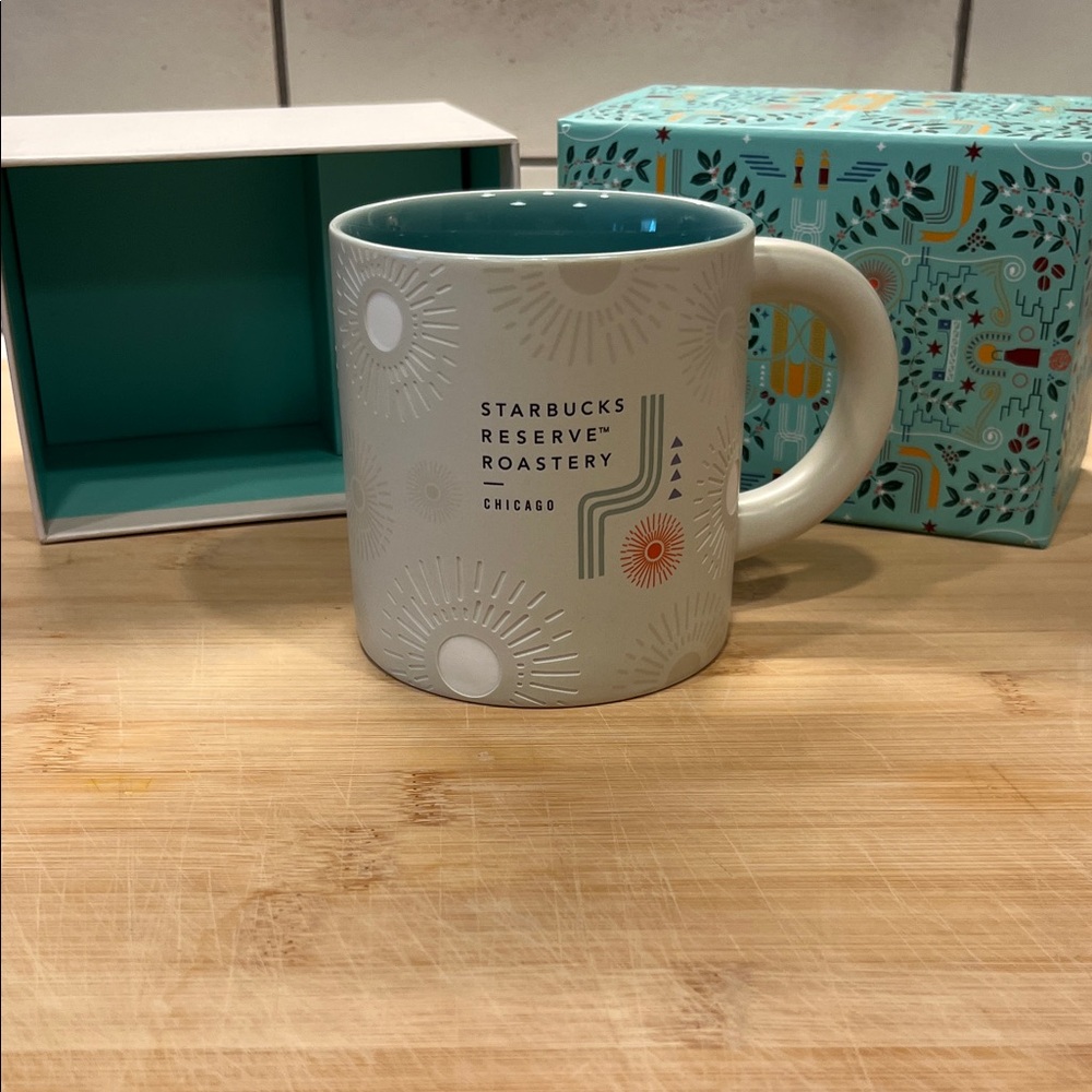 Starbucks Cream Mug with Teal Interior and Sunburst Accents